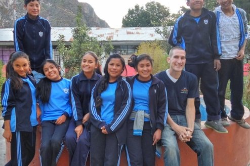 Volunteer Teacher in a Rural School Volunteer Greg with his students